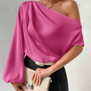 Brand new but no tags. Super cute satin blouse for Spring-Summer!